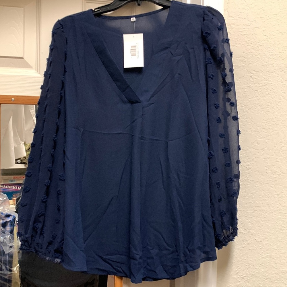 New with tags, navy blue blouse.  V-neck Solid Loose Long Puff Sheer Sleeve